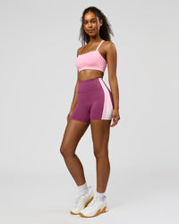 Woman wearing Revitalise Ultra High-Rise 4" Short - Boysenberry - Pink Rose | Model:Jordan | Size:S | Thumbnail Index: 4