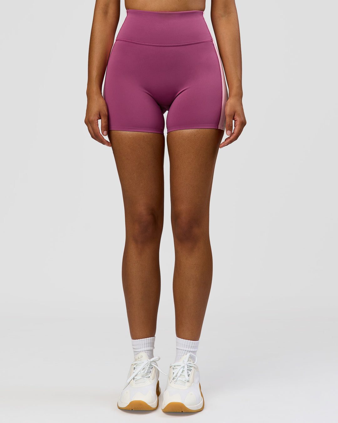 Woman wearing Revitalise Ultra High-Rise 4" Short - Boysenberry - Pink Rose | Model:Jordan | Size:S - view 2