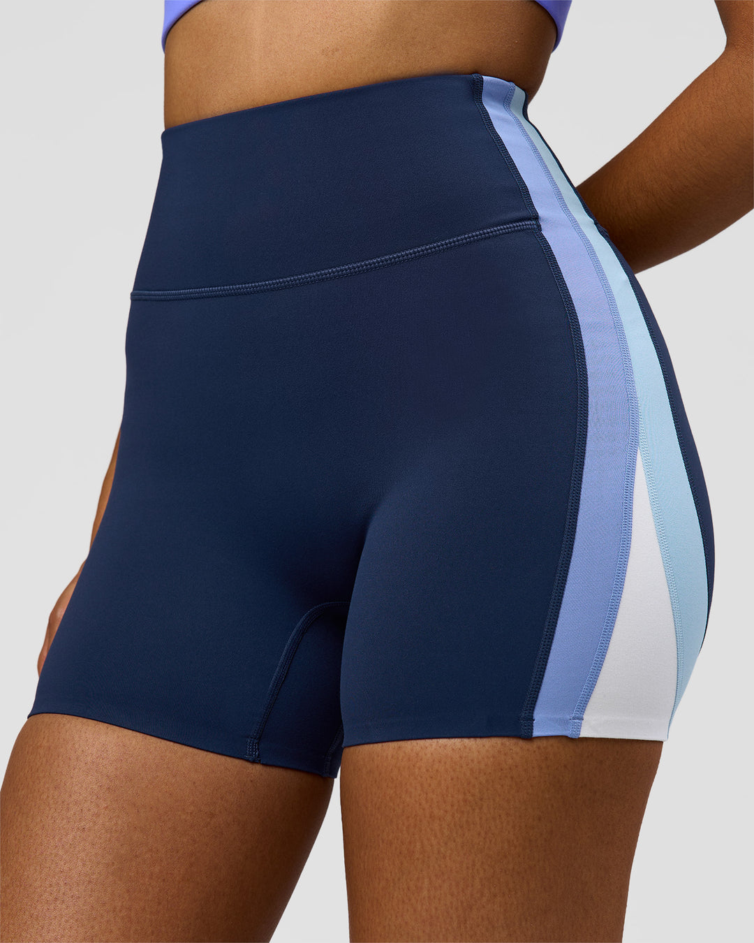 Woman wearing Revitalise Ultra High-Rise 4" Short - Future Navy - Bluebell | Model:Jordan | Size:S - view 2