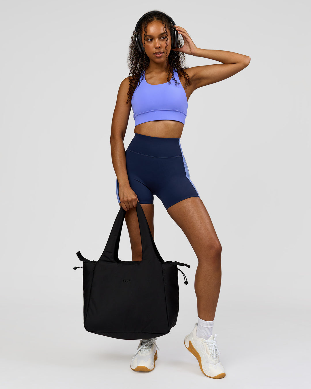 Woman wearing Revitalise Ultra High-Rise 4" Short - Future Navy - Bluebell | Model:Jordan | Size:S - view 7