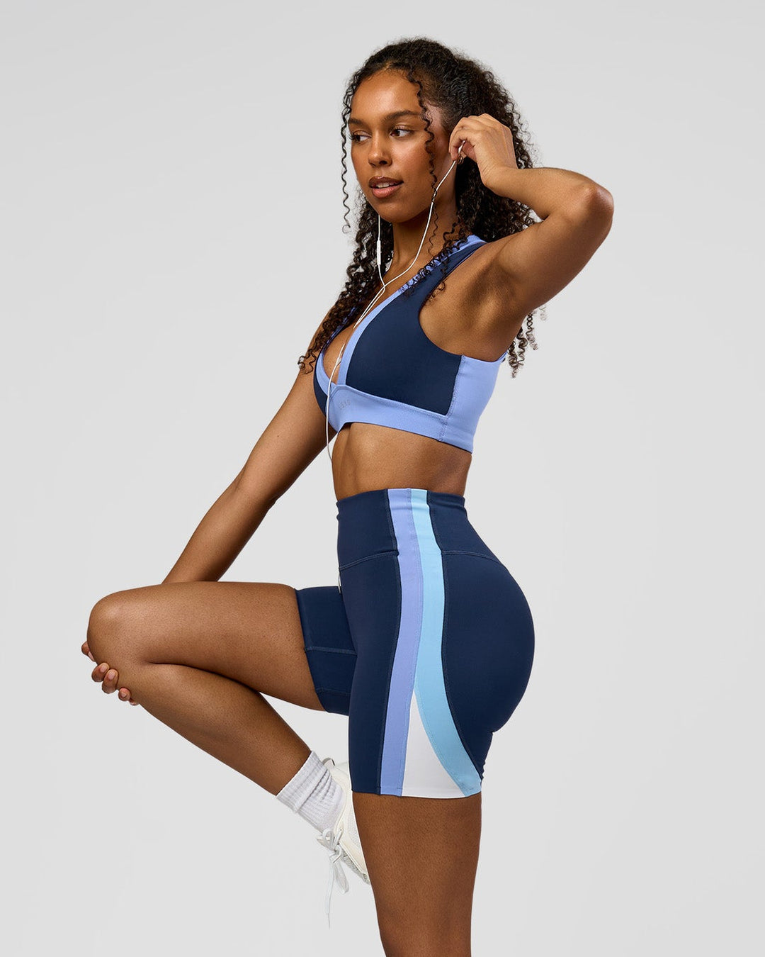 Woman wearing Revitalise Ultra High-Rise 6" Short - Future Navy-Bluebell | Model:Jordan | Size:S - view 1