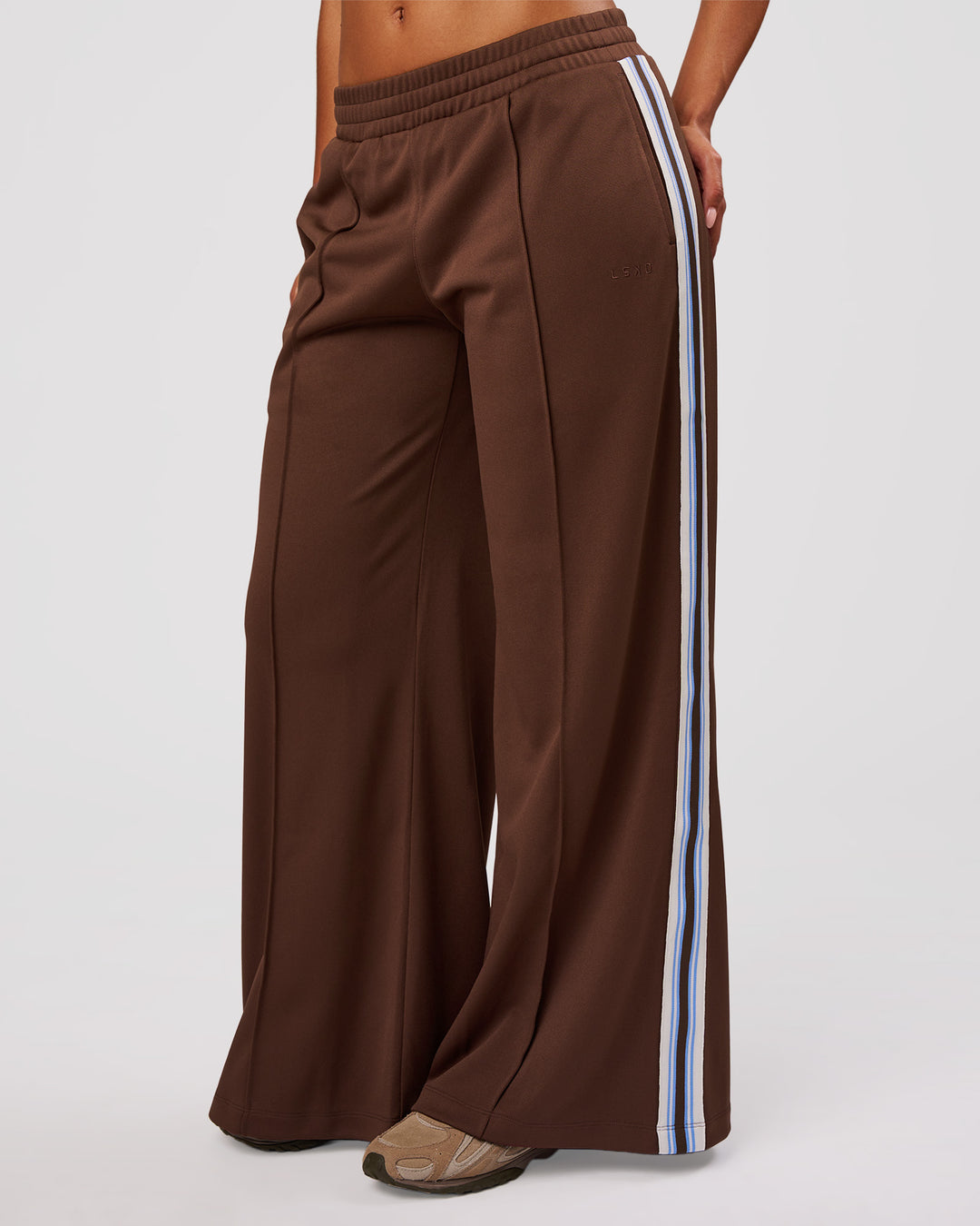 Woman wearing Urban Wide Leg Track Pant - Hot Chocolate-Open Air | Model:Jordan | Size:S - view 1