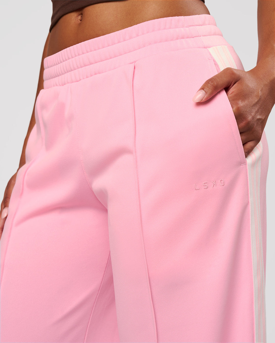 Woman wearing Urban Wide Leg Track Pant - Pink Rose | Model:Jordan | Size:S - view 5