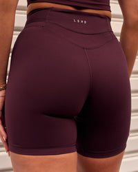 Woman wearing Solstice High-Rise 6" Short - Cherry Lacquer | Model:Remy | Size:S | Thumbnail Index: 1
