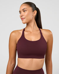 Woman wearing Twist Sports Bra D/DD/E - Cherry Lacquer | Model:Rhiley | Size:S | Thumbnail Index: 2