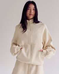 Woman wearing Bree Oversized Fleece Zip Thru - Vanilla Bean | Model:Rianna | Size:S | Thumbnail Index: 18