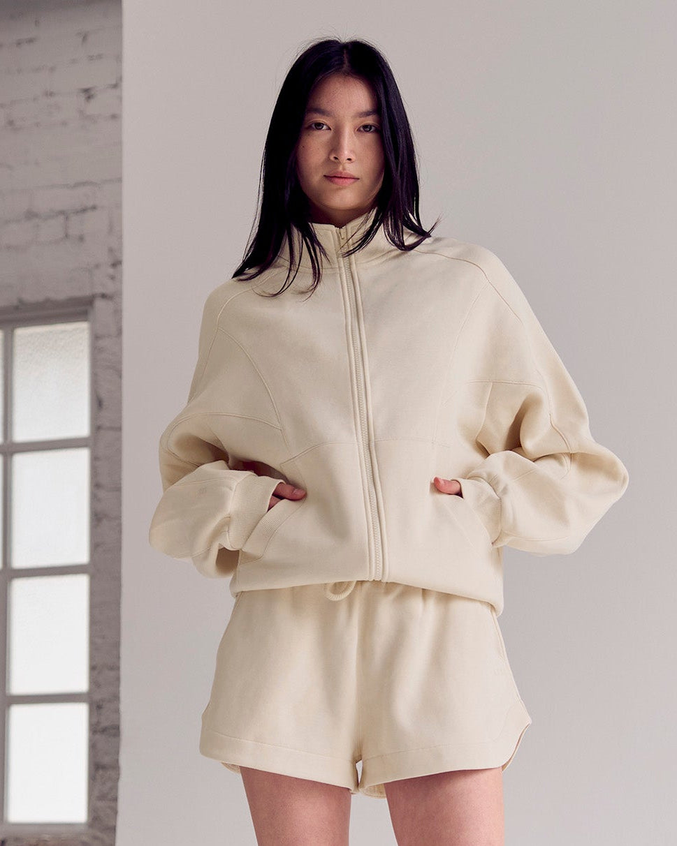 Woman wearing Bree Oversized Fleece Zip Thru - Vanilla Bean | Model:Rianna | Size:S