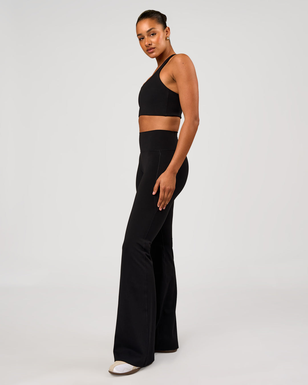 Woman wearing Flow Long Line Sports Bra - Black | Model:Rosie | Size:S - view 4