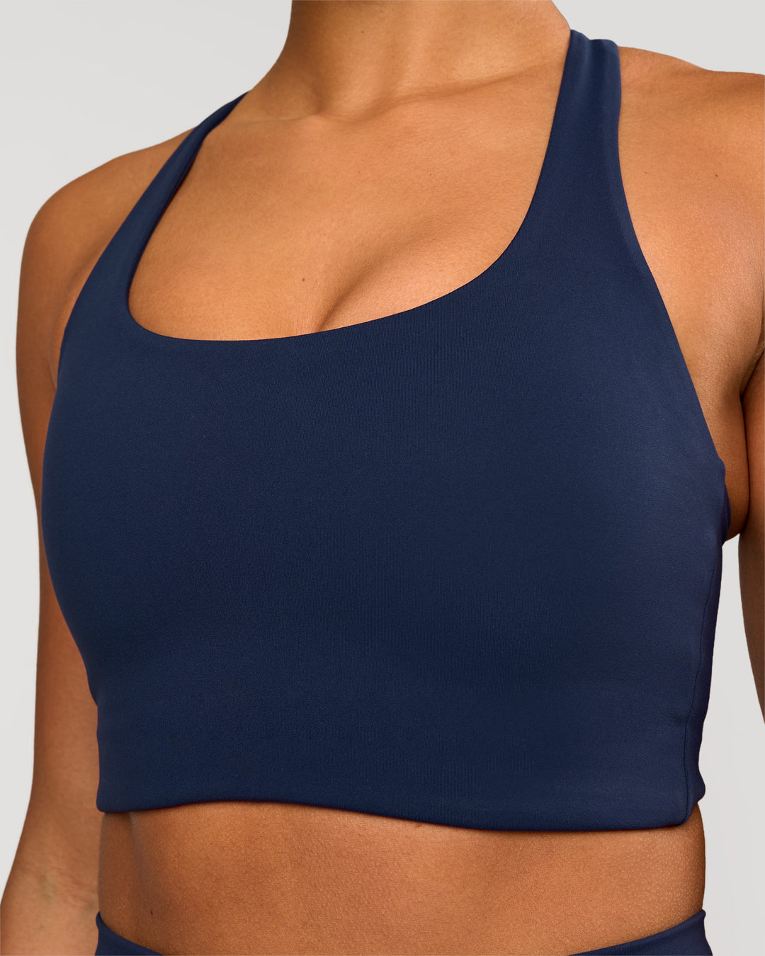 Woman wearing Flow Long Line Sports Bra - Future Navy | Model:Rosie | Size:S - view 2