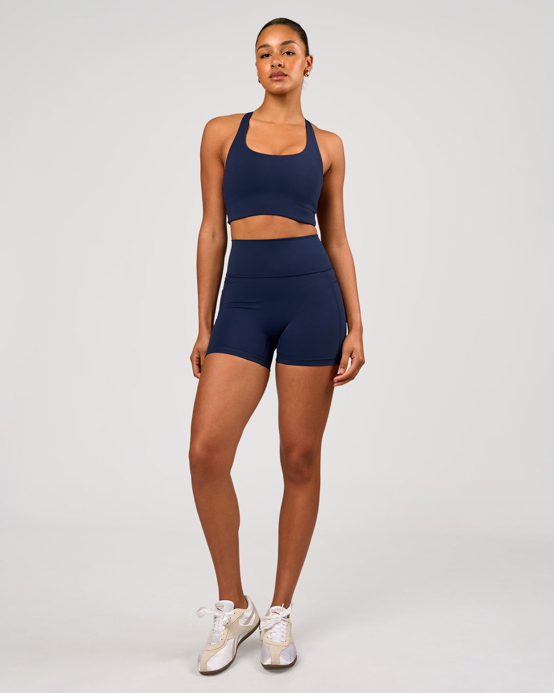 Woman wearing Flow Long Line Sports Bra - Future Navy | Model:Rosie | Size:S - view 6