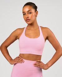 Woman wearing Flow Long Line Sports Bra - Pink Rose | Model:Rosie | Size:S | Thumbnail Index: 1