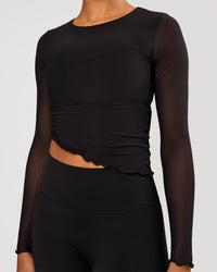 Woman wearing Studio Mesh Asymmetric Long Sleeve - Black | Model:Rosie | Size:S | Thumbnail Index: 0