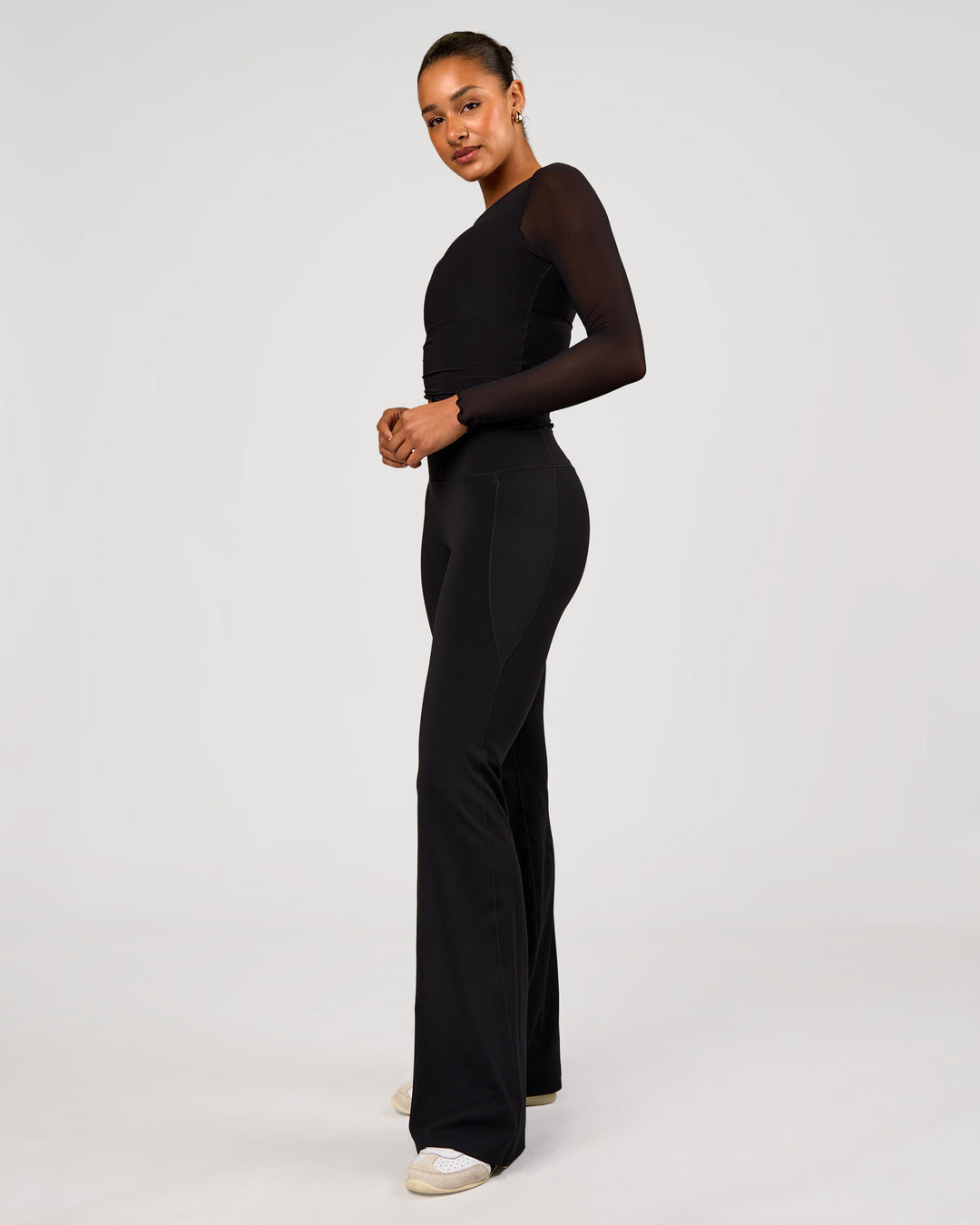Woman wearing Studio Mesh Asymmetric Long Sleeve - Black | Model:Rosie | Size:S - view 4