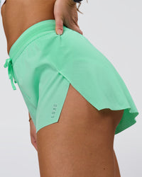 Woman wearing Accelerate 3" High-Rise Running Short - Jelly Mint | Model:Summer | Size:S | Thumbnail Index: 6
