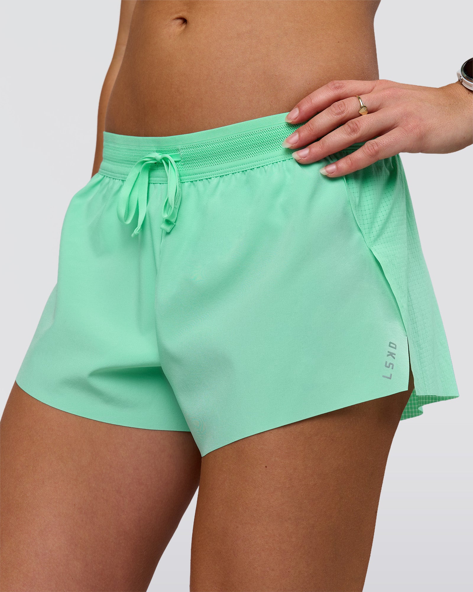 Woman wearing Accelerate 3" Mid-Rise Running Short - Jelly Mint | Model:Summer | Size:S
