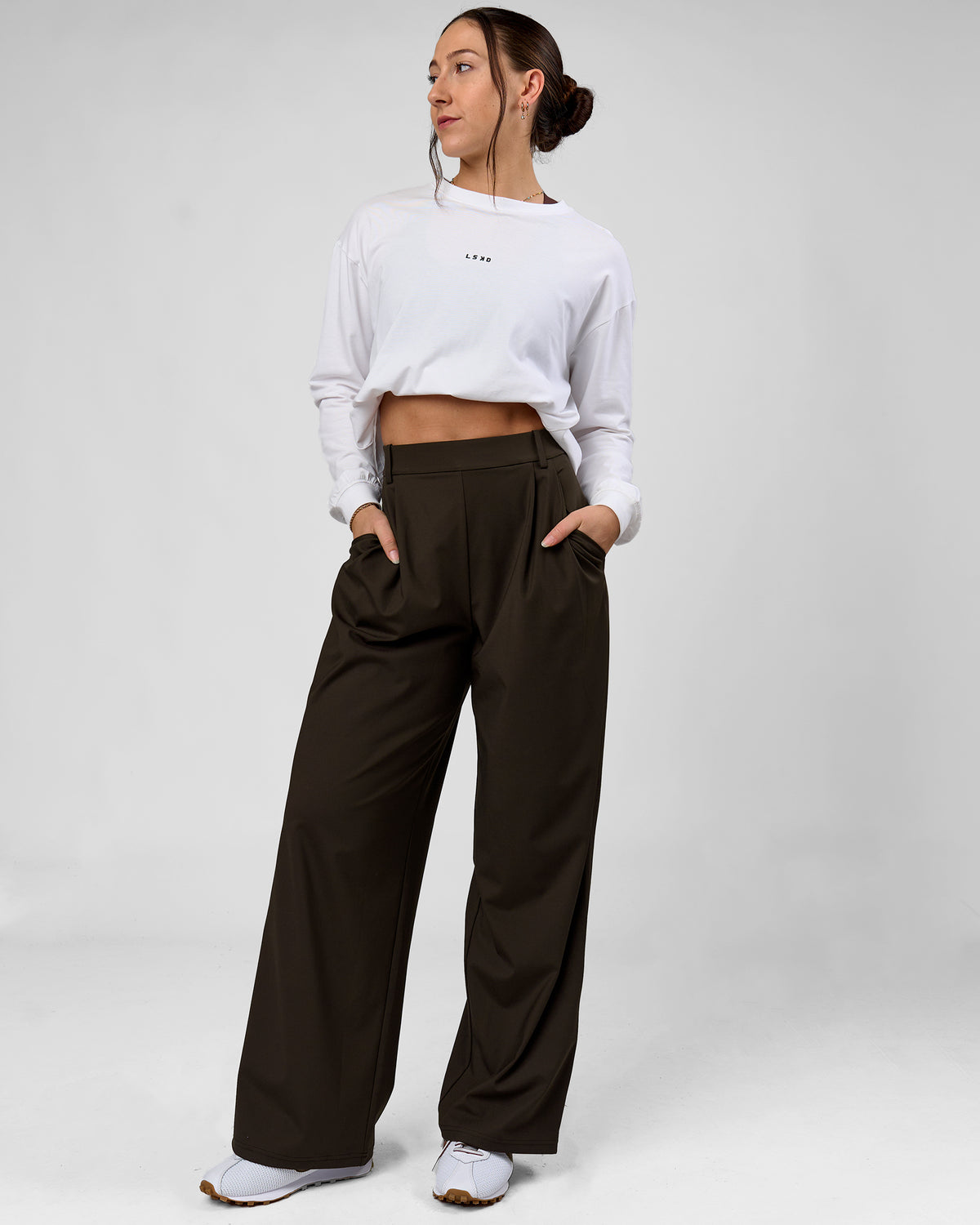 Woman wearing StretchShift Wide Leg Pant - Ground Coffee | Model:Summer | Size:S