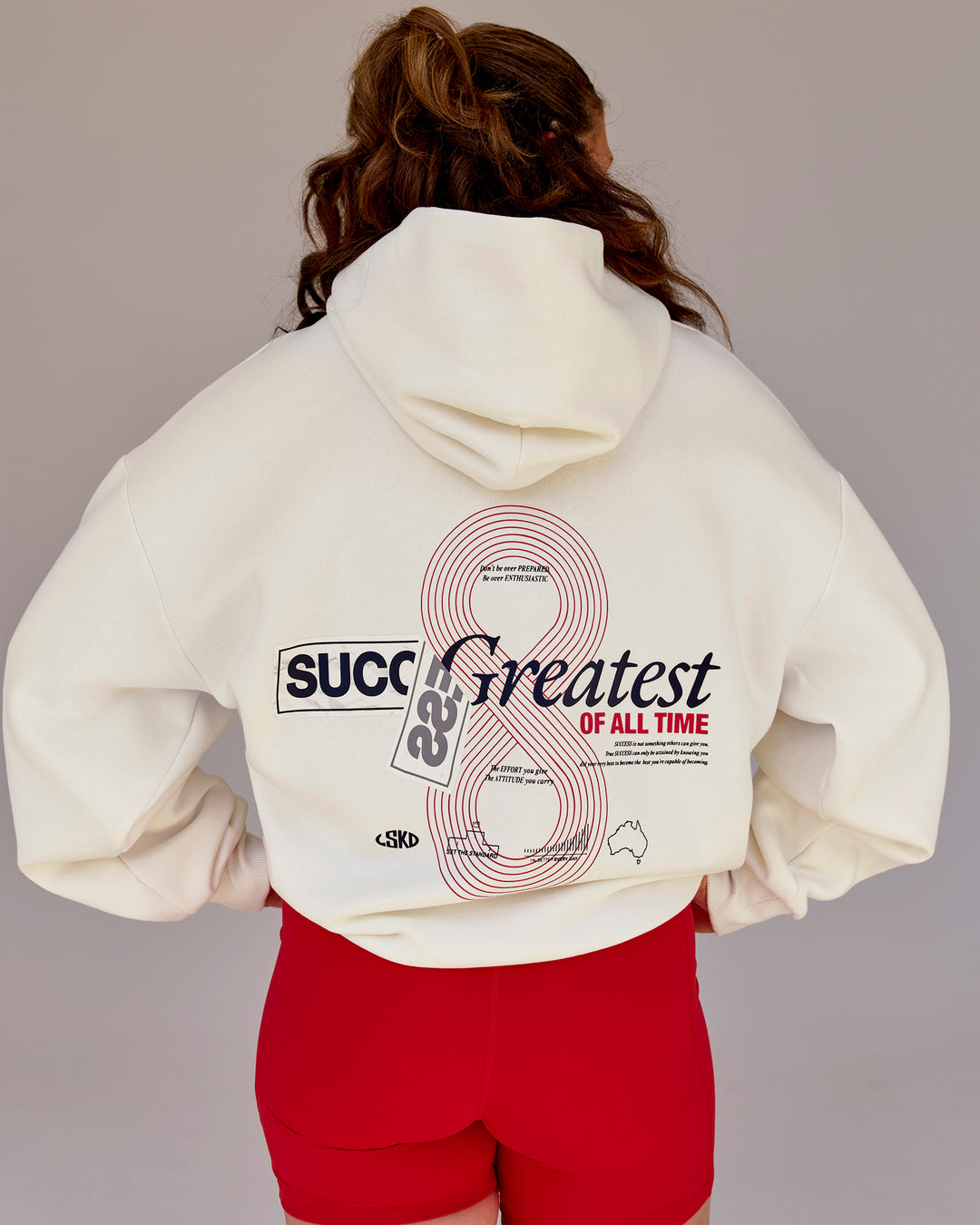 Woman wearing Greatest of All Time Heavyweight Oversized Hoodie - Off White | Model:Tia | Size:S - view 5