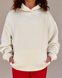 Woman wearing Greatest of All Time Heavyweight Oversized Hoodie - Off White | Model:Tia | Size:S | Thumbnail Index: 12