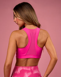 Woman wearing Empowered Sports Bra - Ultra Pink | Model:Tianah | Size:S | Thumbnail Index: 4