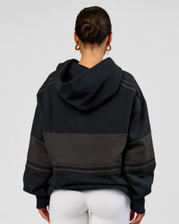 Woman wearing A-Team Oversized Hoodie - Caviar-Onyx | Model:Bianca | Size:XS | Thumbnail Index: 6
