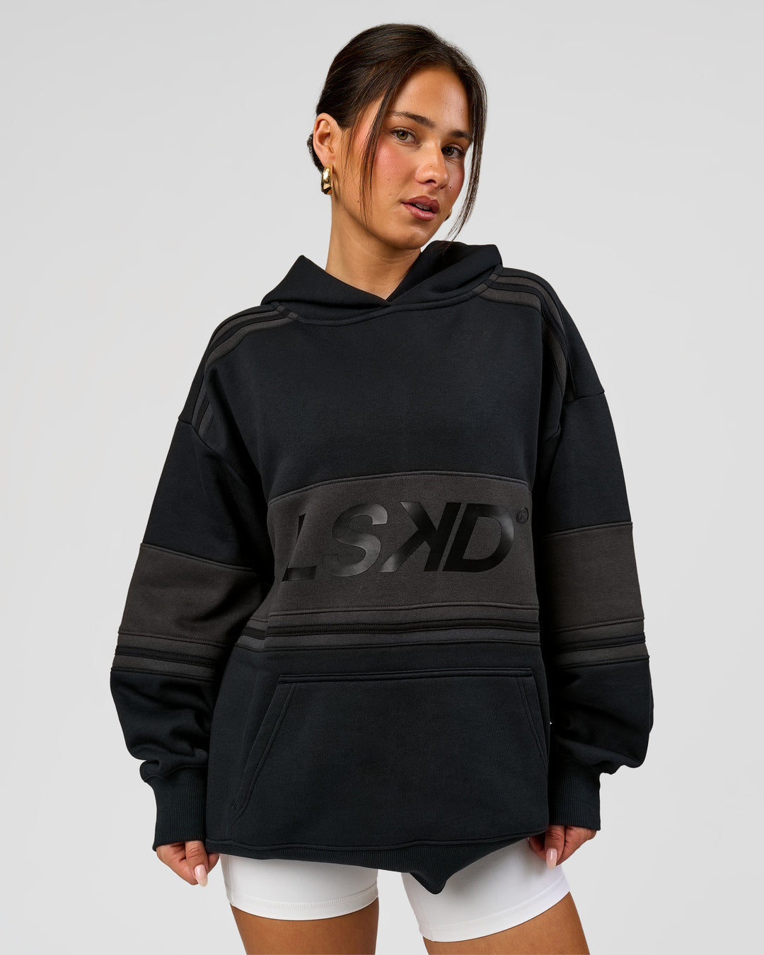 Woman wearing A-Team Oversized Hoodie - Caviar-Onyx | Model:Bianca | Size:XS - view 6