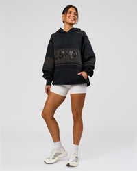 Woman wearing A-Team Oversized Hoodie - Caviar-Onyx | Model:Bianca | Size:XS | Thumbnail Index: 11