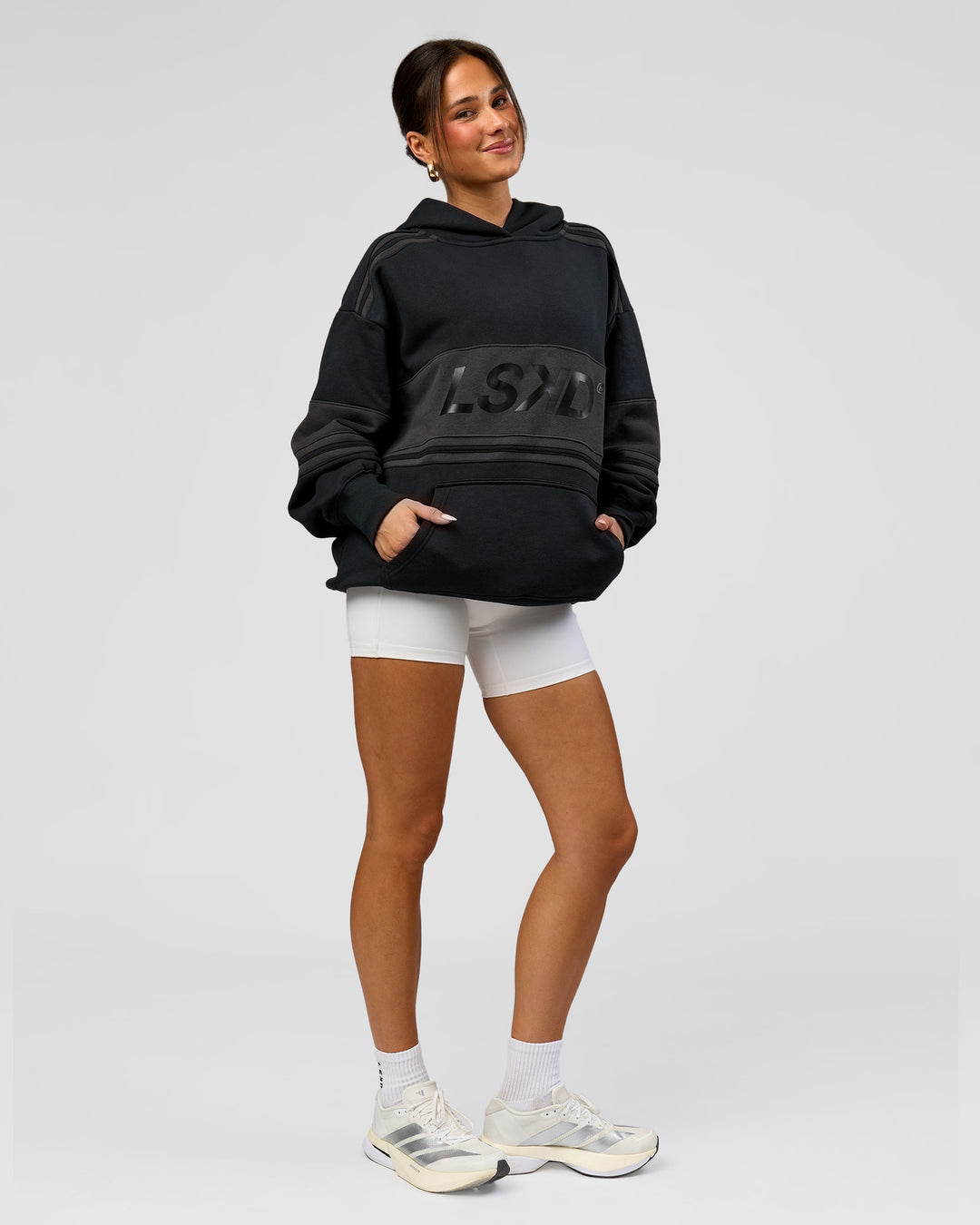 Woman wearing A-Team Oversized Hoodie - Caviar-Onyx | Model:Bianca | Size:XS - view 13