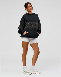 Woman wearing A-Team Oversized Hoodie - Caviar-Onyx | Model:Bianca | Size:XS | Thumbnail Index: 12