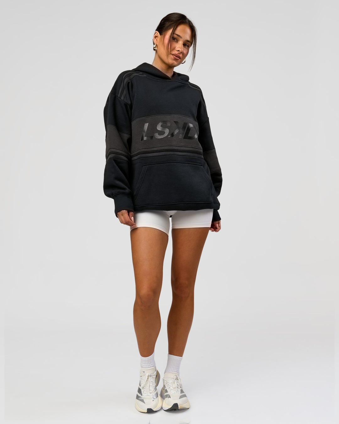 Woman wearing A-Team Oversized Hoodie - Caviar-Onyx | Model:Bianca | Size:XS - view 14