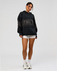 Woman wearing A-Team Oversized Hoodie - Caviar-Onyx | Model:Bianca | Size:XS | Thumbnail Index: 13