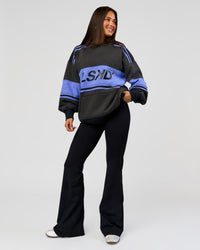 Woman wearing A-Team Oversized Hoodie - Onyx-Bluebell | Model:Bianca | Size:XS | Thumbnail Index: 9