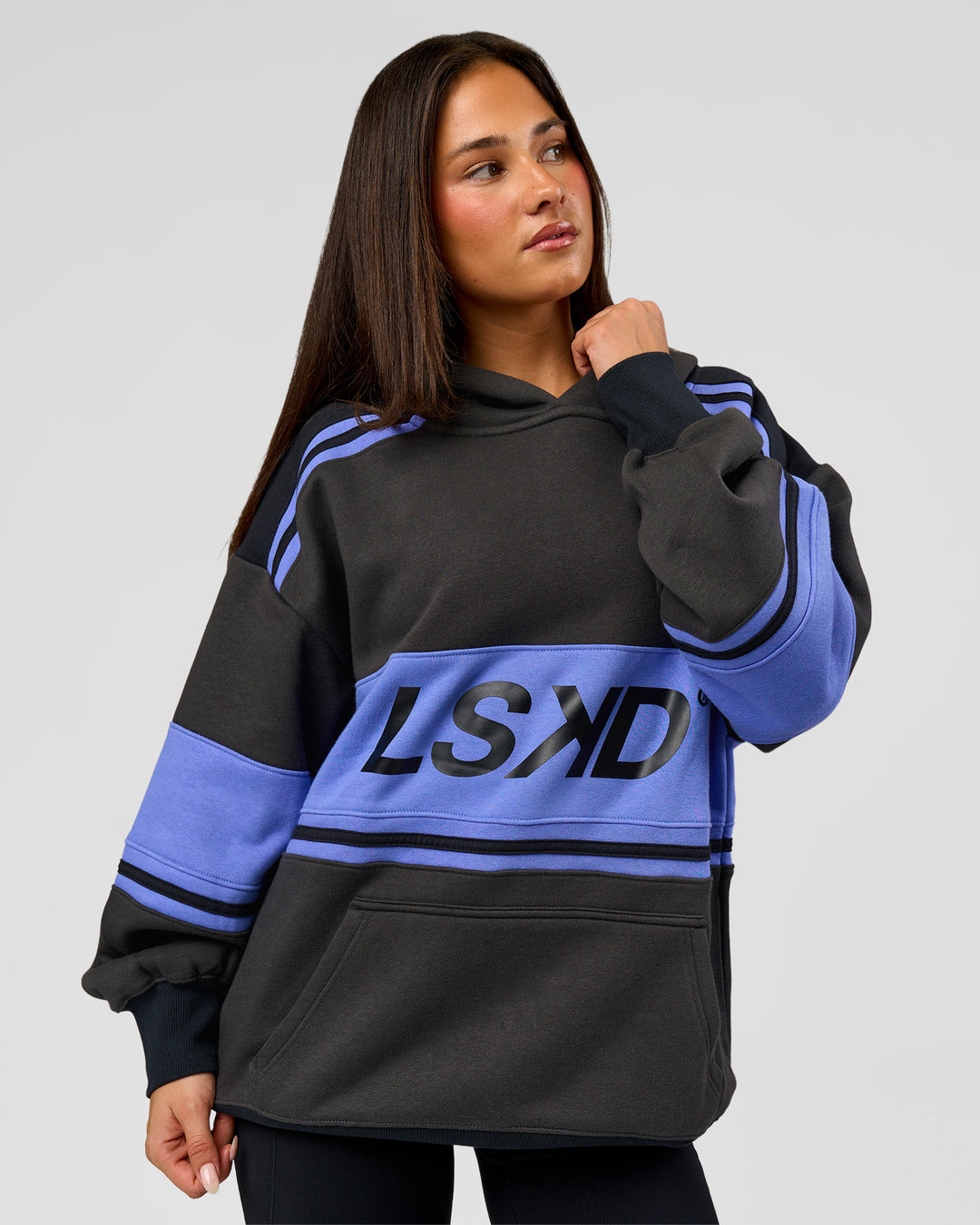 Woman wearing A-Team Oversized Hoodie - Onyx-Bluebell | Model:Bianca | Size:XS - view 5