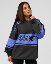 Woman wearing A-Team Oversized Hoodie - Onyx-Bluebell | Model:Bianca | Size:XS | Thumbnail Index: 4
