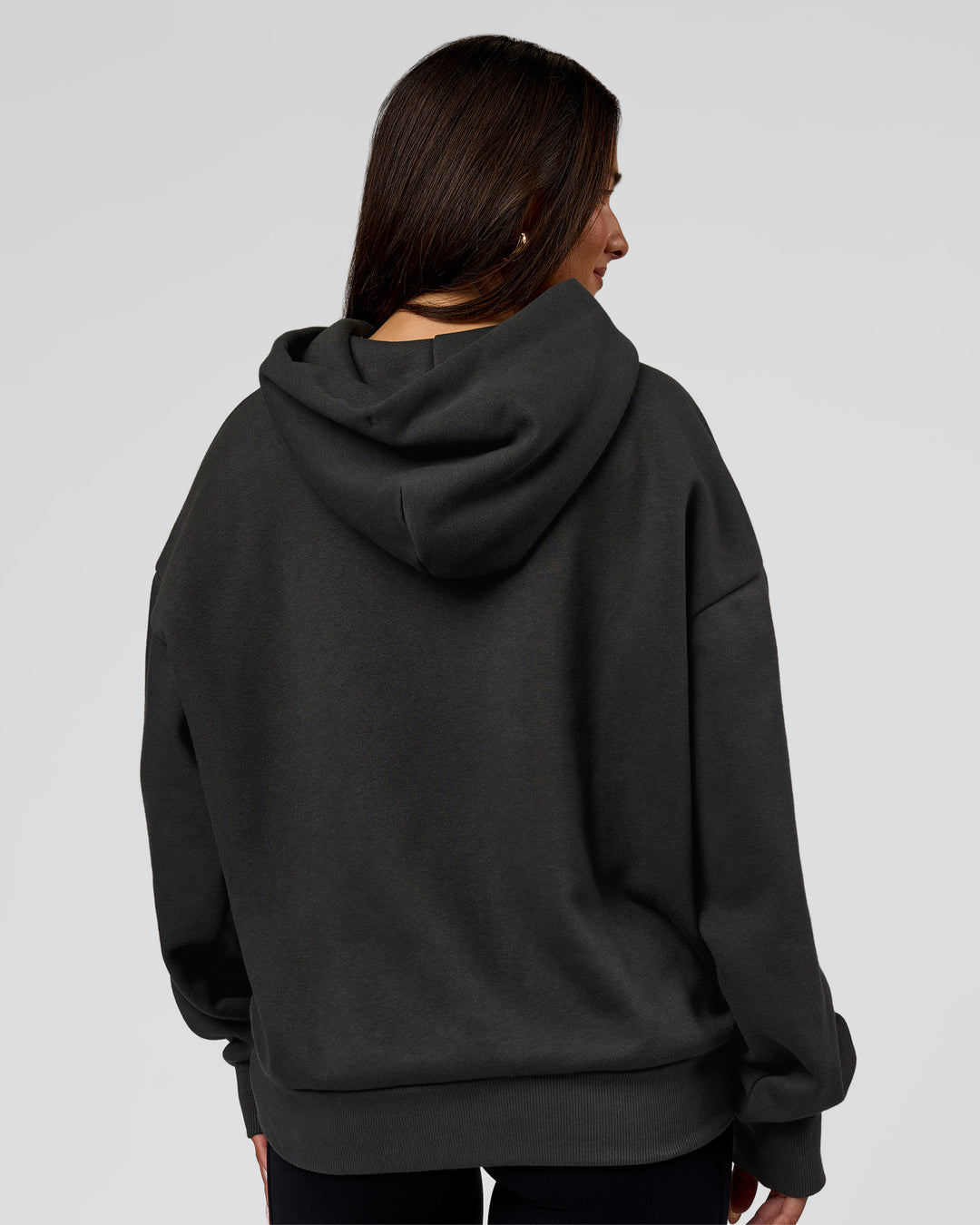 Woman wearing Base Oversized DC Hoodie - Onyx | Model:Bianca | Size:XS - view 6