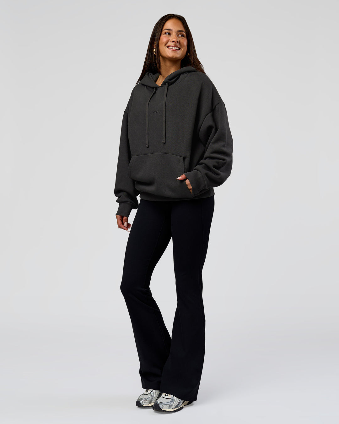 Woman wearing Base Oversized DC Hoodie - Onyx | Model:Bianca | Size:XS - view 9