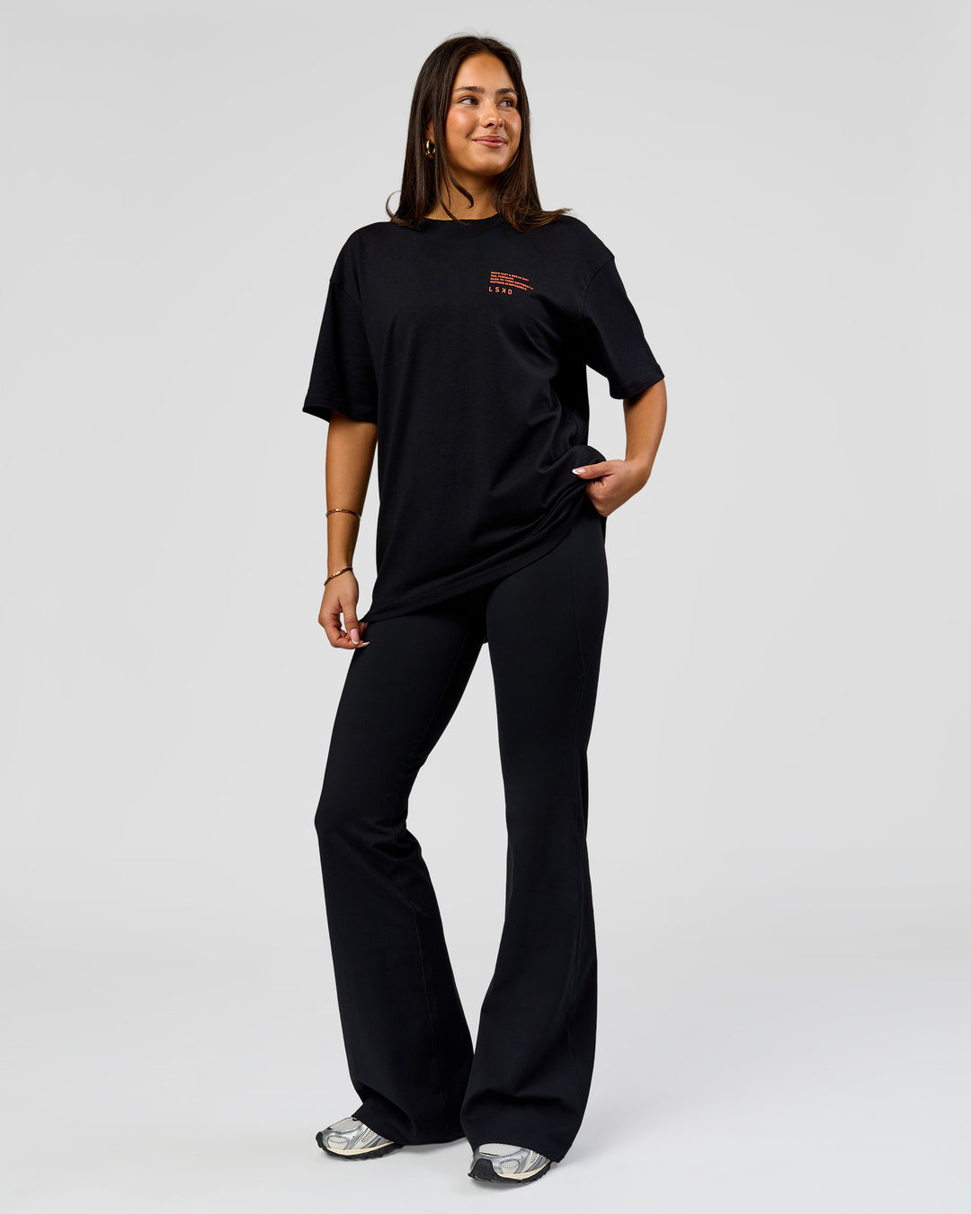 Woman wearing Coffee Run FLXCotton Oversized Tee - Black-Ultra Orange | Model:Bianca | Size:XS - view 20