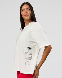 Woman wearing Greatest of All Time Heavyweight FLXCotton Boxed Tee - Off White Washed | Model:Rhiley| Size:XS | Thumbnail Index: 11