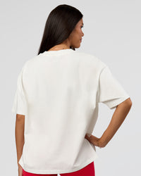 Woman wearing Greatest of All Time Heavyweight FLXCotton Boxed Tee - Off White Washed | Model:Bianca | Size:XS | Thumbnail Index: 12