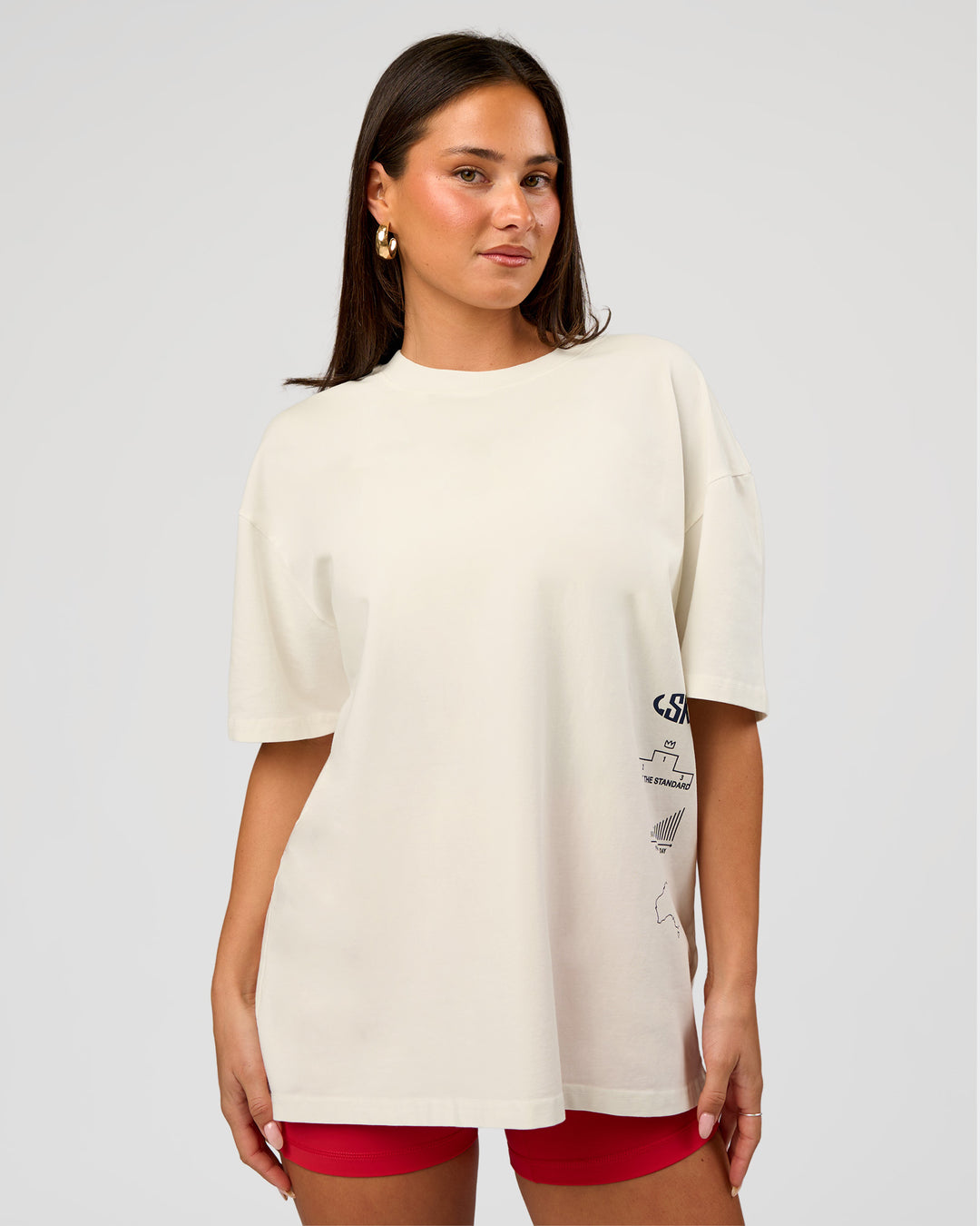 Woman wearing Greatest of All Time Heavyweight FLXCotton Oversized Tee - Off White Washed-Scarlet | Model:Bianca | Size:XS - view 10