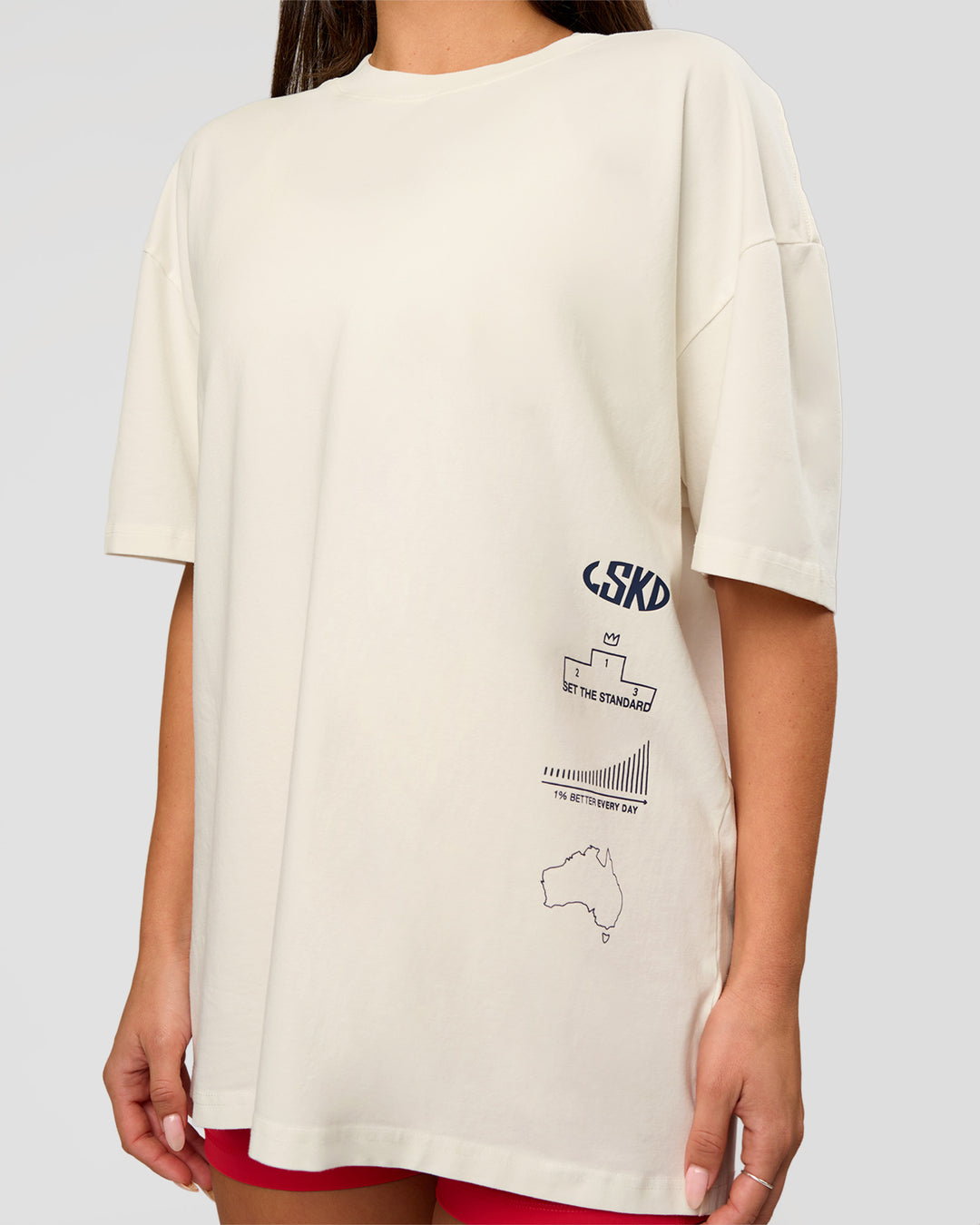 Woman wearing Greatest of All Time Heavyweight FLXCotton Oversized Tee - Off White Washed-Scarlet | Model:Bianca | Size:XS - view 11