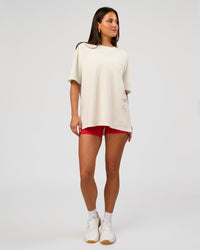 Woman wearing Greatest of All Time Heavyweight FLXCotton Oversized Tee - Off White Washed-Scarlet | Model:Bianca | Size:XS | Thumbnail Index: 11
