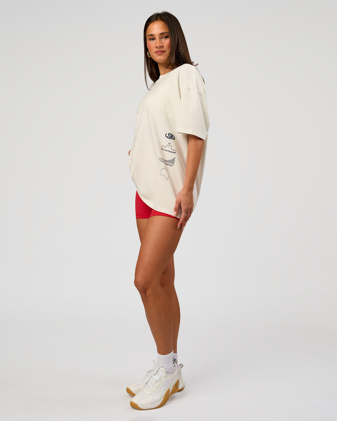 Woman wearing Greatest of All Time Heavyweight FLXCotton Oversized Tee - Off White Washed-Scarlet | Model:Bianca | Size:XS - view 9