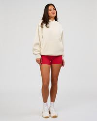 Woman wearing Greatest of All Time Heavyweight Oversized Hoodie - Off White | Model:Bianca | Size:XS | Thumbnail Index: 10