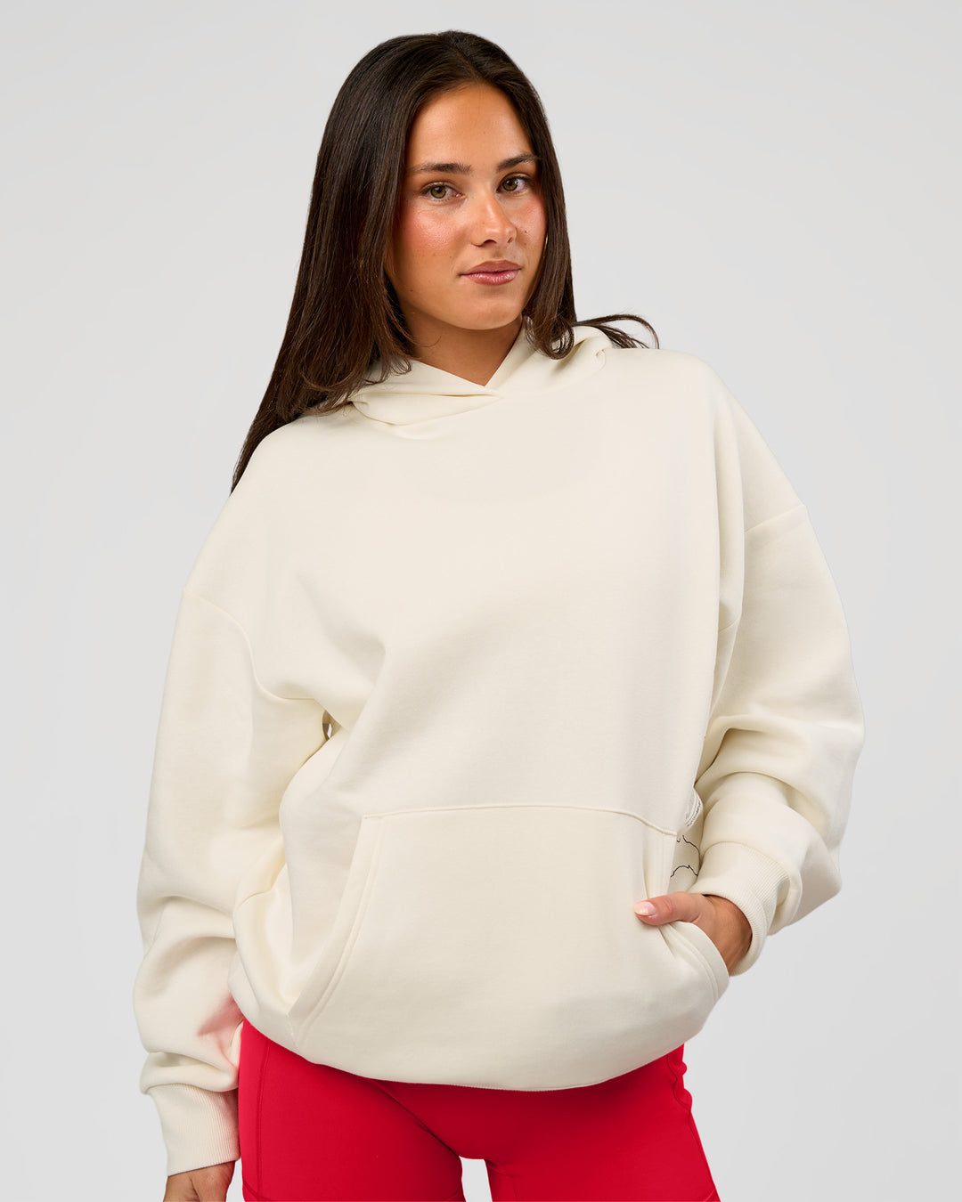 Woman wearing Greatest of All Time Heavyweight Oversized Hoodie - Off White | Model:Bianca | Size:XS - view 6