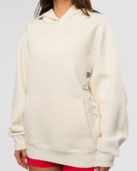 Woman wearing Greatest of All Time Heavyweight Oversized Hoodie - Off White | Model:Bianca | Size:XS | Thumbnail Index: 17