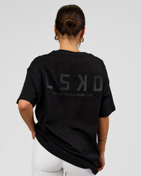 Woman wearing Tonal Legacy Heavyweight Oversized Tee - Black-Black | Model:Bianca | Size:XS | Thumbnail Index: 2