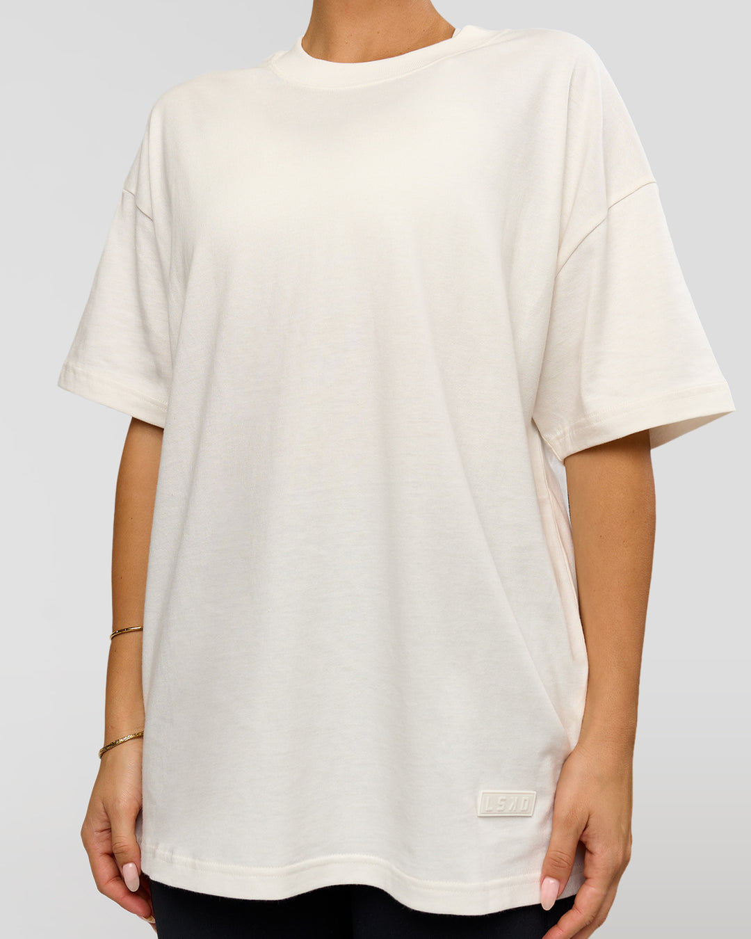Woman wearing Tonal Legacy Heavyweight Oversized Tee - Off White-Off White | Model:Bianca | Size:XS - view 11