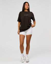Woman wearing VS1 Enjoy The Journey FLXCotton Oversize Tee - Ground Coffee | Model:Bianca | Size:XS | Thumbnail Index: 7