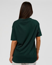Woman wearing VS1 Enjoy The Journey FLXCotton Oversize Tee - Midnight Green | Model:Bianca | Size:XS | Thumbnail Index: 5