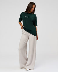 Woman wearing VS1 Enjoy The Journey FLXCotton Oversize Tee - Midnight Green | Model:Bianca | Size:XS | Thumbnail Index: 12